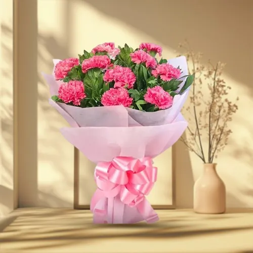 Shop for a ravishing Tissue Wrapped Hand Bouquet of Pink Carnations