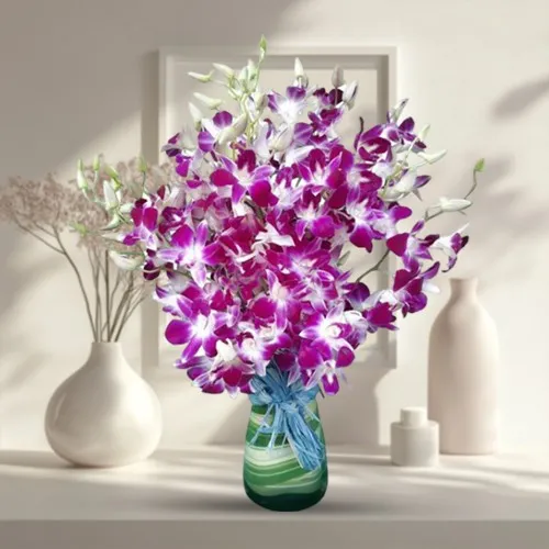 Brilliant Glass Vase Arrangement of Orchids