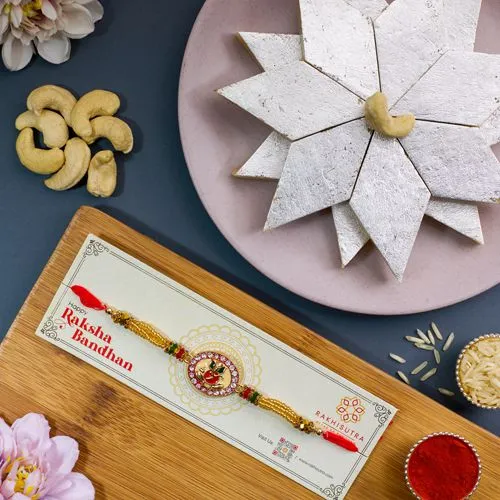 Divine Ganesha Rakhi N Kaju Katli Delight