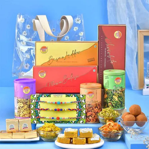 Festive Rakhi Trio  N  Assorted Treats Combo