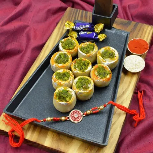 Designer Metal Stone Rakhi with Haldiram Sweets n Cadbury Eclairs