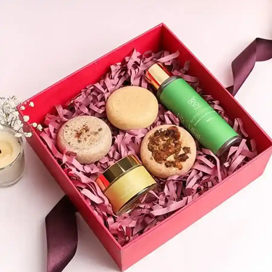 Golden Glow Beauty Collection featuring goat milk soaps, hair oil, and 24k magic mask for luminous skin.