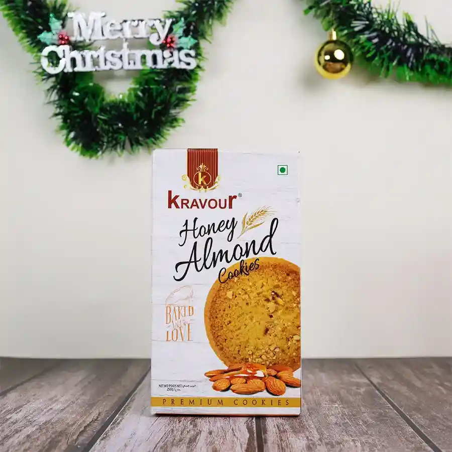 A festive gift hamper featuring Kravour Honey Almond Cookies for the holidays.
