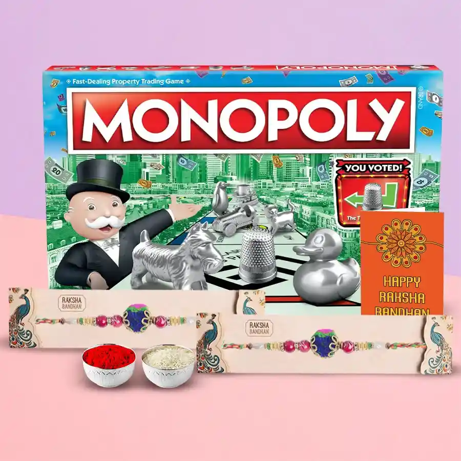 Lovely Monopoly game bundle with two colorful Rakhis, Roli Tilak, and Chawal essentials for Raksha Bandhan celebration