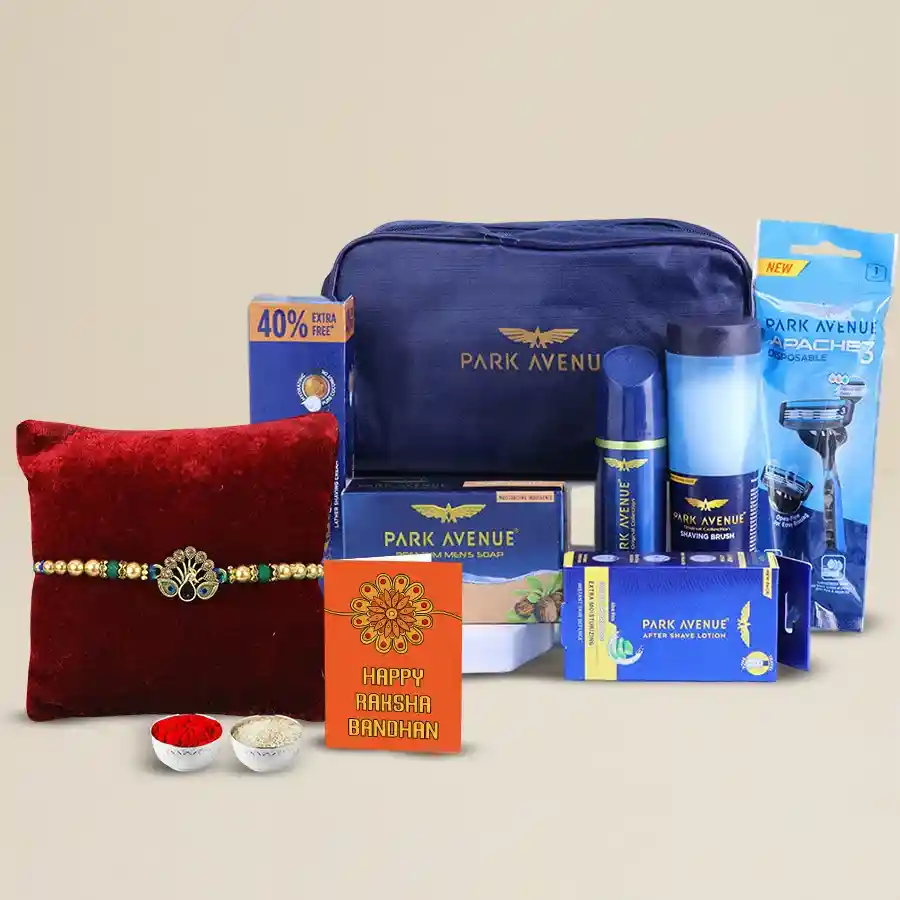 Delightful Park Avenue Gift set featuring a beautifully designed Rakhi, Roli, Tilak, and Chawal arranged elegantly for Raksha Bandhan celebration.