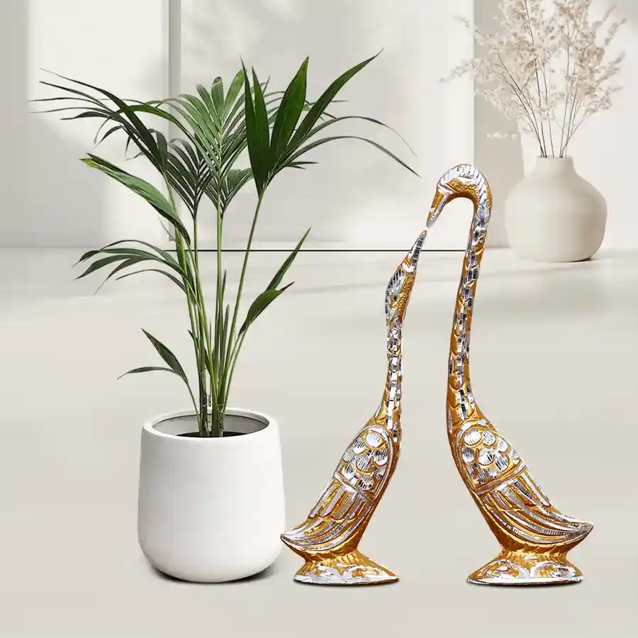 Kentia Palm Plant and Metal Love Birds Figurine combo in a white pot.