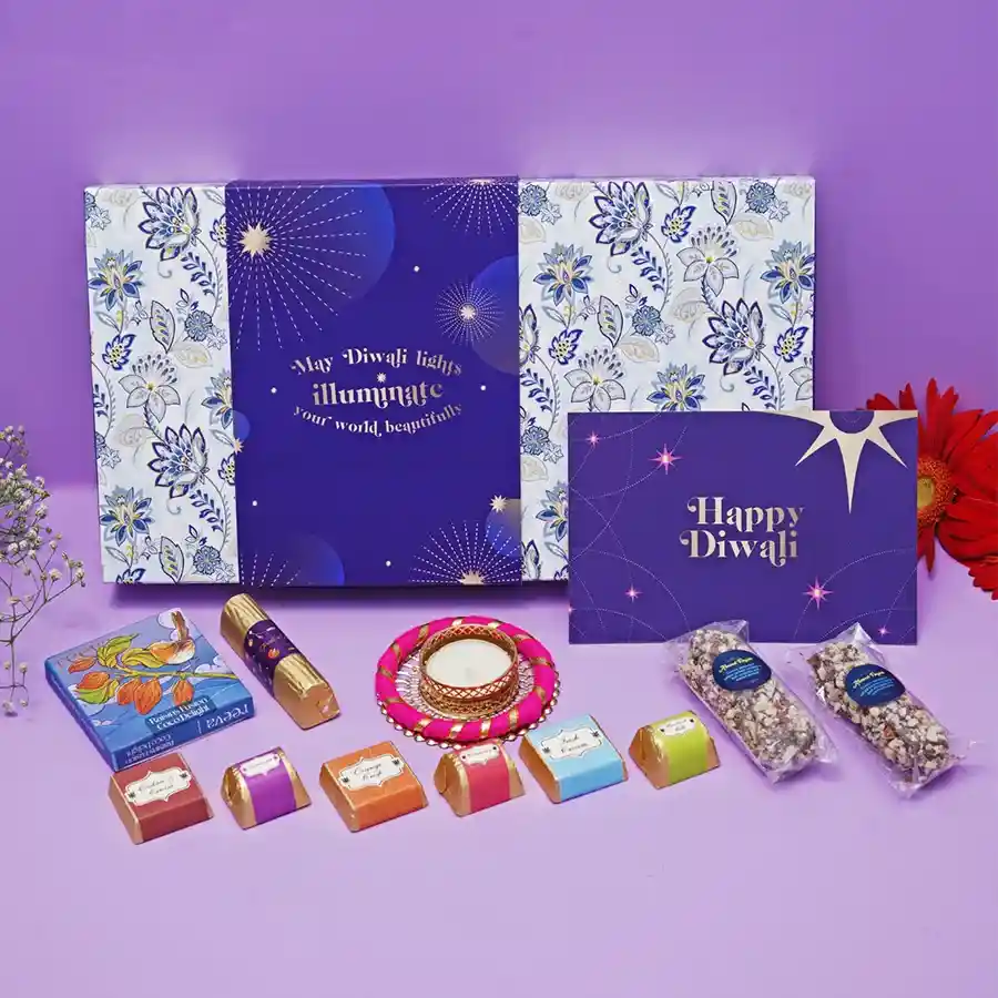 Joyful Chocolaty Celebration Box filled with assorted chocolates, a Diya, and a Happy Diwali Card