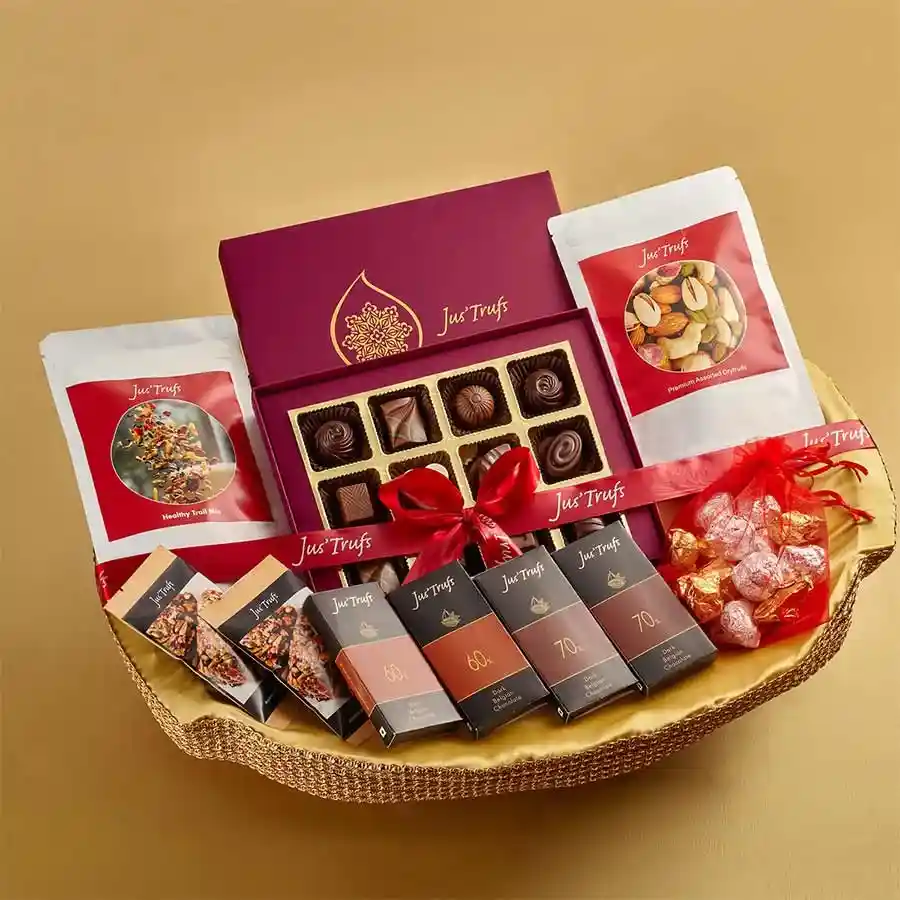Choco Bliss Celebration Hamper featuring Healthy Trail Mix, Belgian chocolate bars, chocolate truffles in a Mandala box, premium dry fruits, chocolate almond rocks, and vegan nut and seed bars.