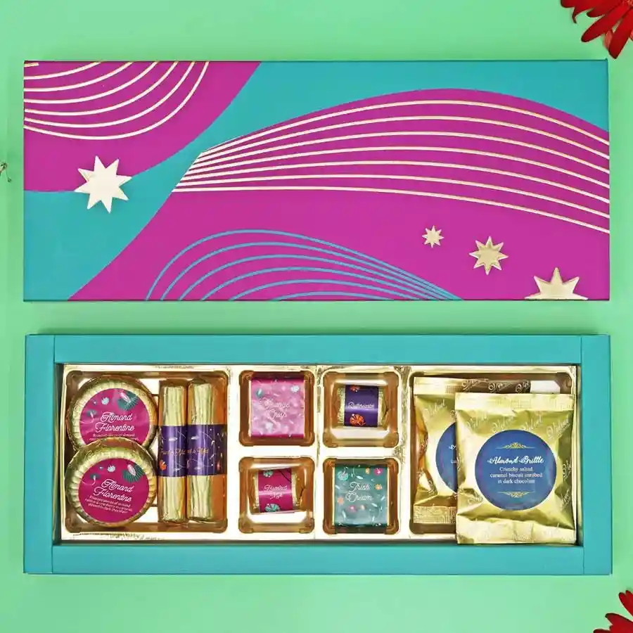Gourmet Almond and Chocolate Collection featuring Almond Florentines, Fruit and Nut Chocolate Logs, assorted chocolates, and Almond Brittles.