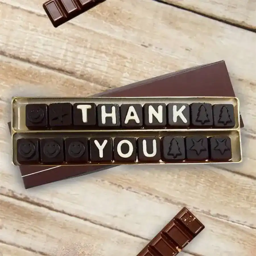 Handcrafted homemade chocolate box labeled "Thank You" with an assortment of rich chocolates inside.