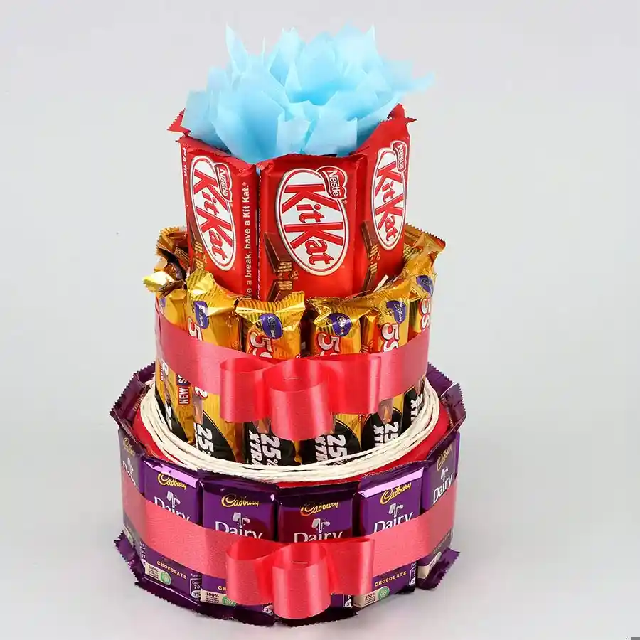 Marvellous 3 tier arrangement of assorted chocolates including Cadbury Dairy Milk, Cadbury Five Star, and Nestle Kitkat.
