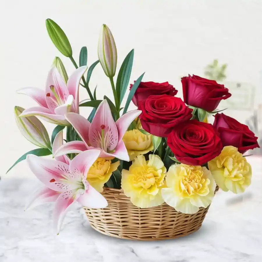A beautiful arrangement featuring 4 Asiatic lilies, 6 roses, and 5 carnations in a vibrant display.