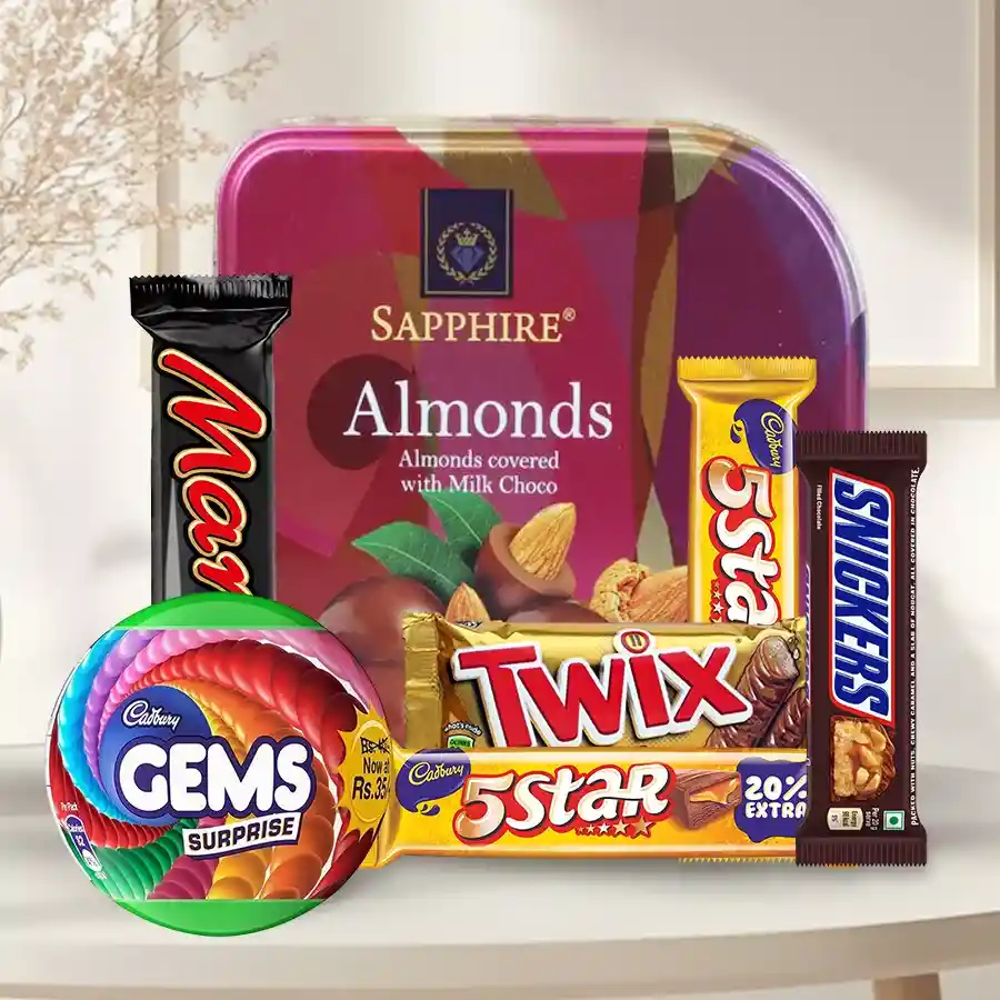 Delicious chocolate gift hamper featuring Cadbury Gems, 5 Stars, Mars, Twix, Snickers, and a Sapphire Chocolate Tin