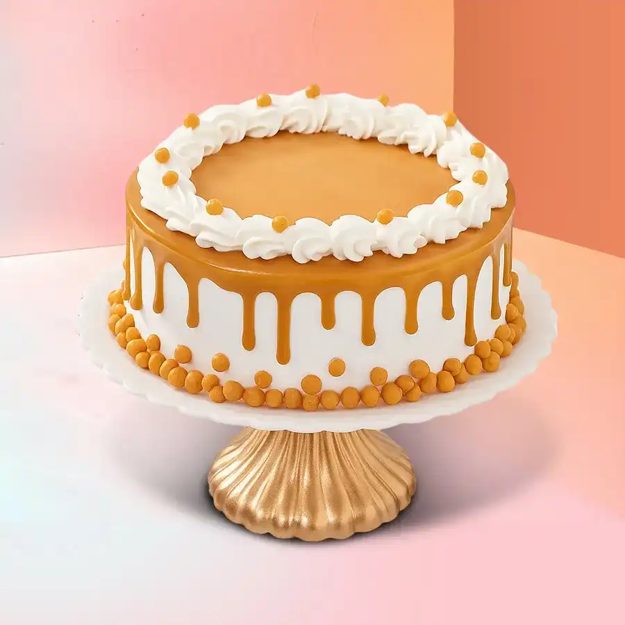Butterscotch Bliss Indulgence Cake with creamy frosting and crunchy bits