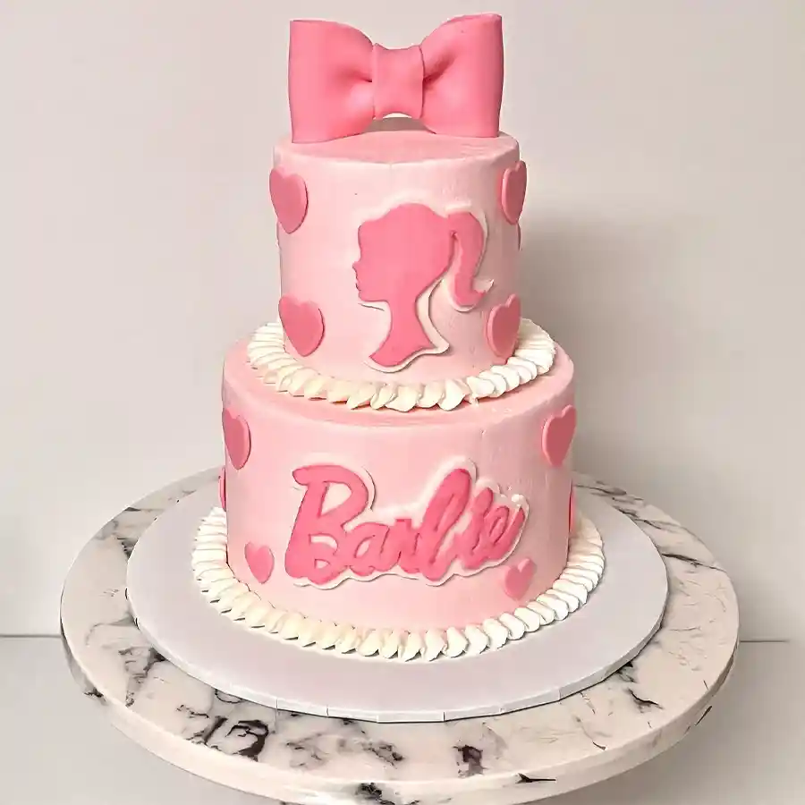 A dazzling 2 Tier Barbie Birthday Special Cake, beautifully decorated for celebrations, weighing 4 kg and designed to delight children and adults alike.