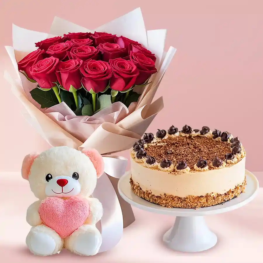 Gift combo featuring 10 red roses, coffee cake, and a small teddy bear.