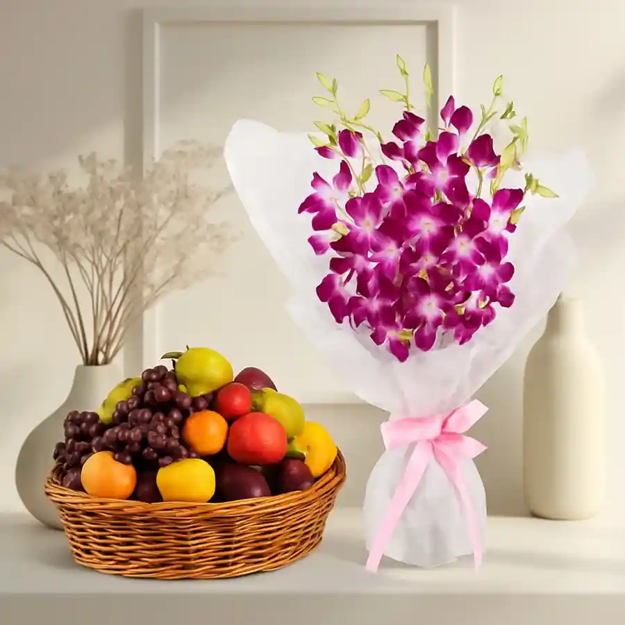 A beautiful arrangement featuring a 2 kg Fresh Fruits Basket alongside 8 vibrant Orchids, creating a delightful gift set.