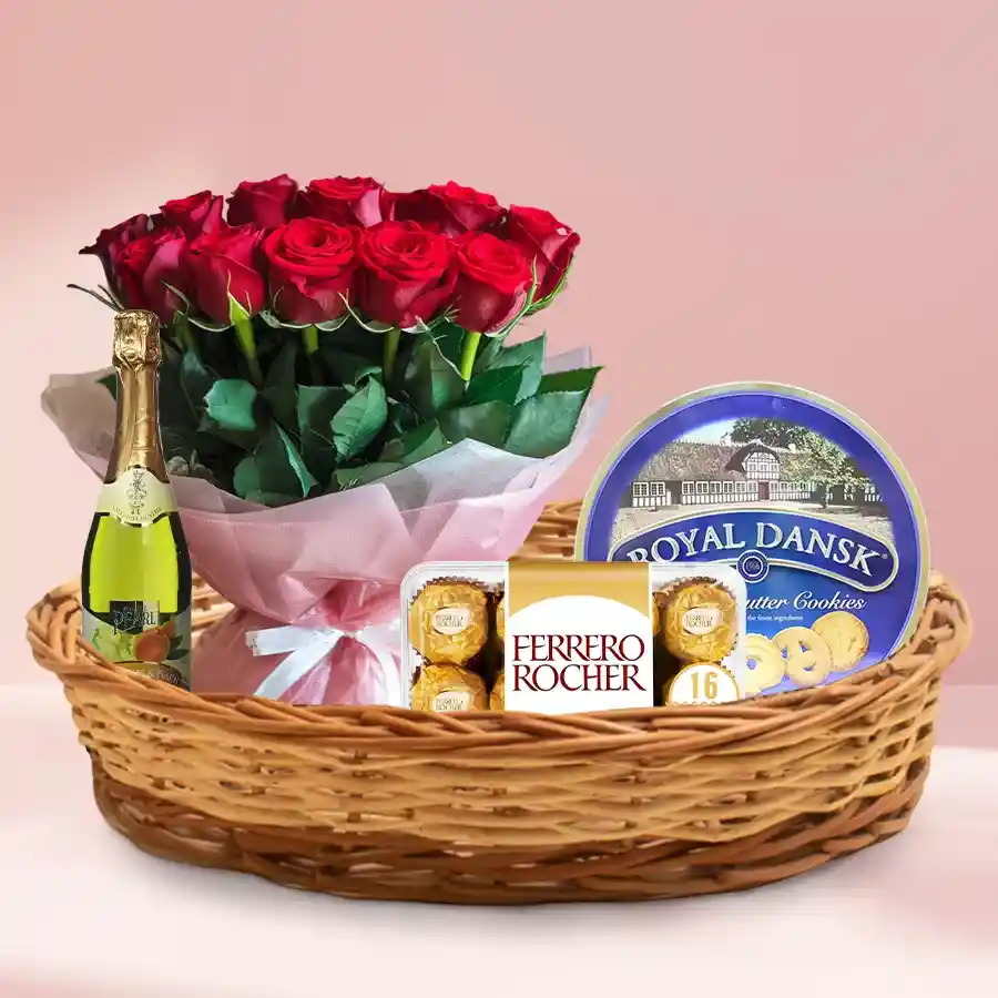 Traditional Love in a Basket with roses, chocolates, cookies, and juice.