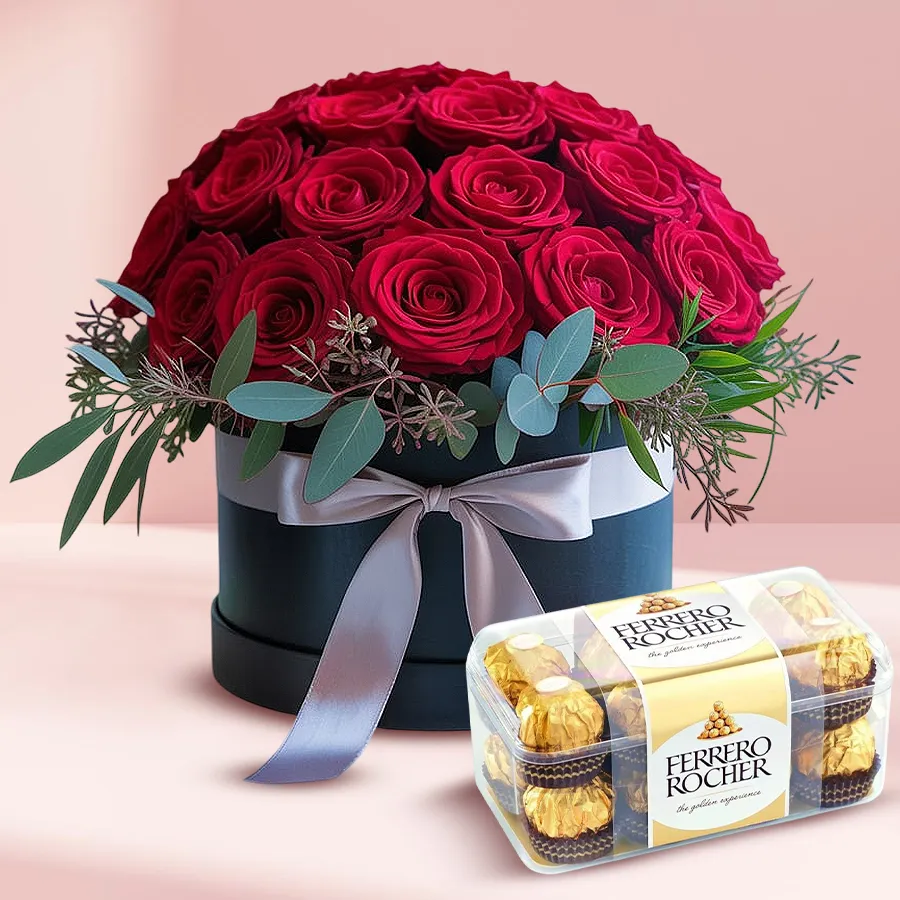 Premium gift bucket featuring 24 red roses and a box of Ferrero Rocher chocolates.