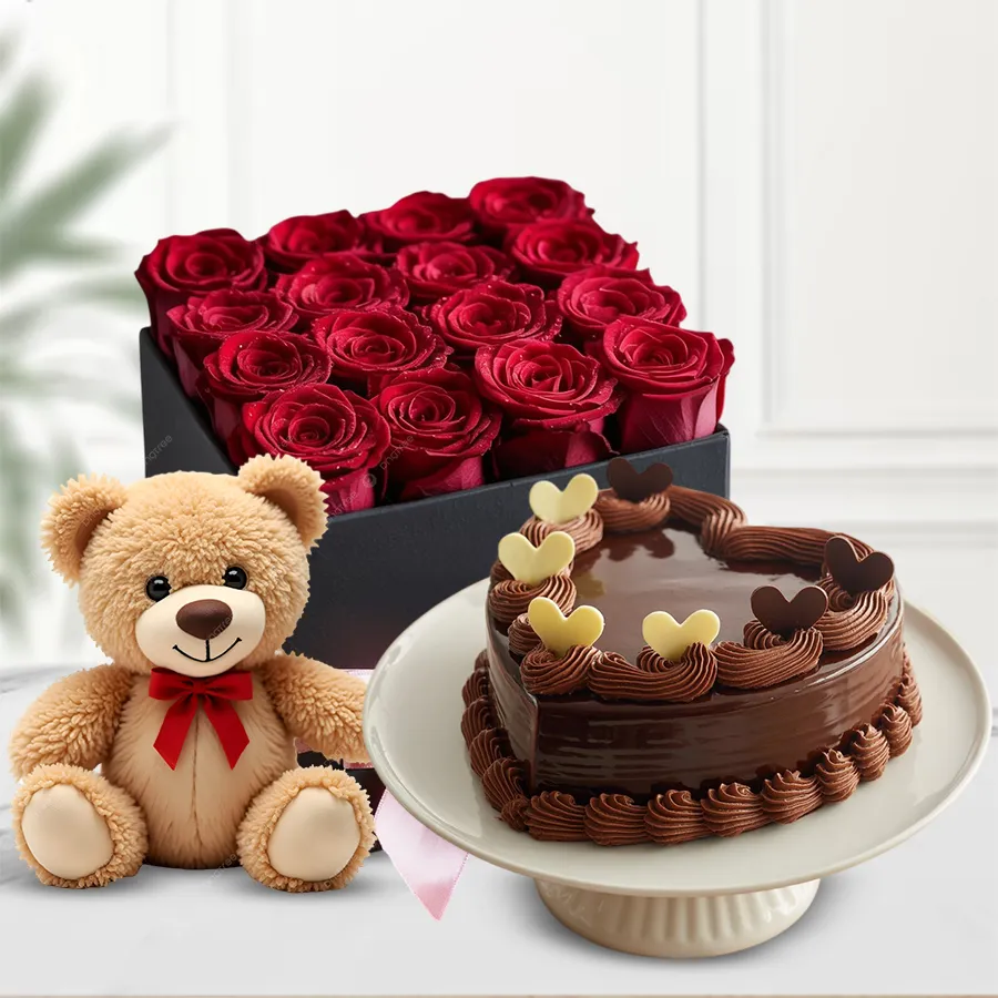 Heartfelt gift featuring 16 red roses, a teddy bear, and a heart-shaped chocolate cake.