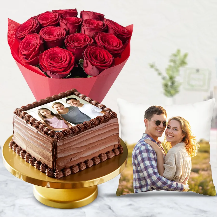 A heartfelt gift set featuring a personalized photo chocolate cake, a bouquet of 12 red roses, and a cozy personalized photo cushion.