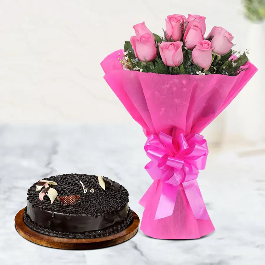 Dark chocolate cake paired with a bunch of 12 pink roses for a romantic surprise.