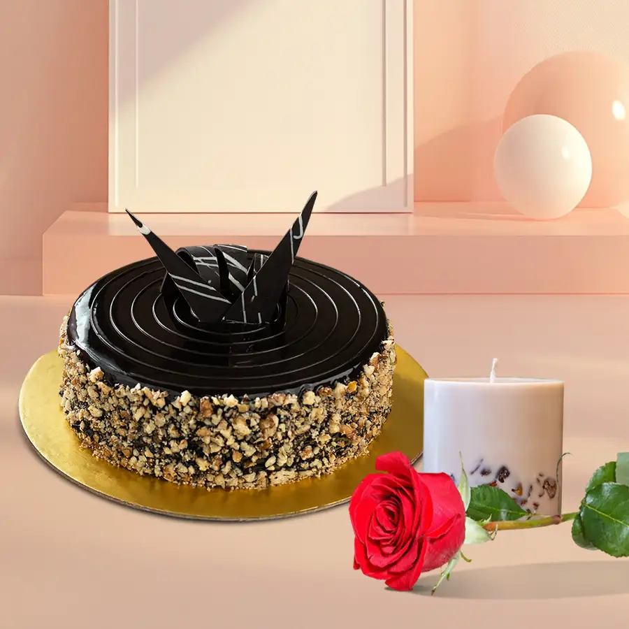Valentine's gift set featuring a chocolate cake, rose, and aroma candles.