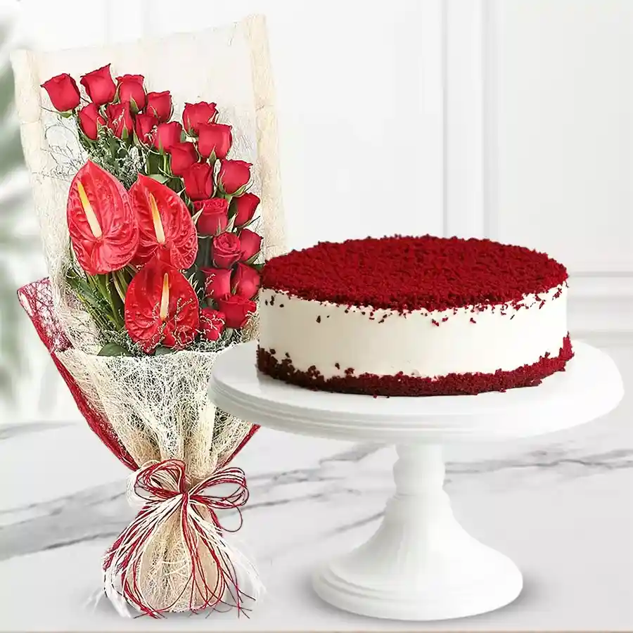 Blissful Red Romance Ensemble with roses, anthuriums, and red velvet cake.
