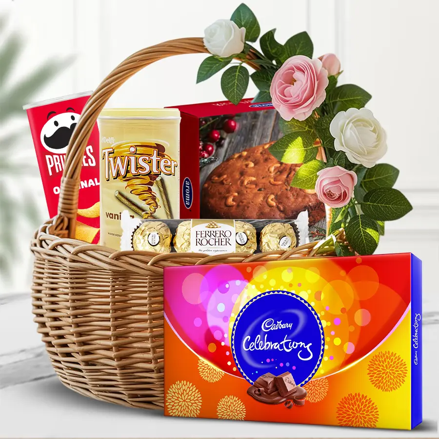 Pristine Gourmet Delights Gift Basket with chips, chocolates, and festive cake.