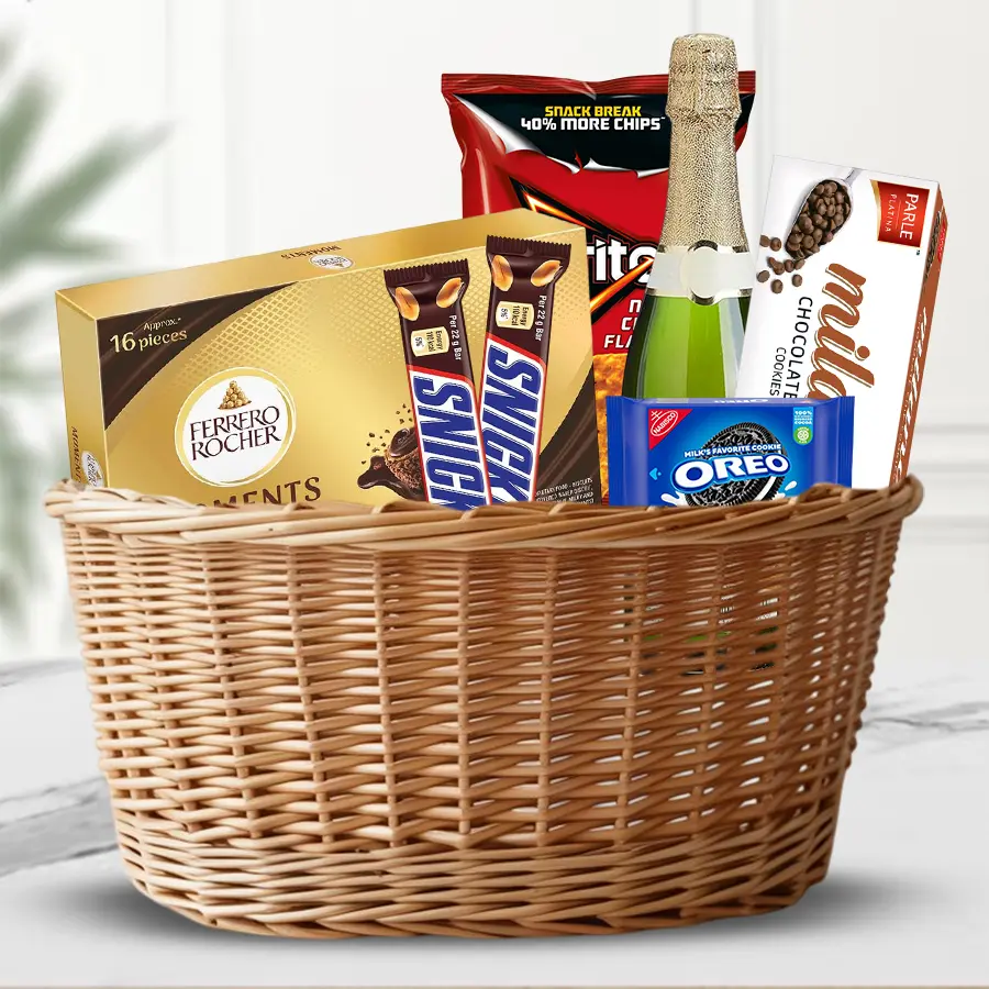 Elegant Xmas Treats Gift Basket featuring chocolates, cookies, and sparkling wine for festive celebrations.