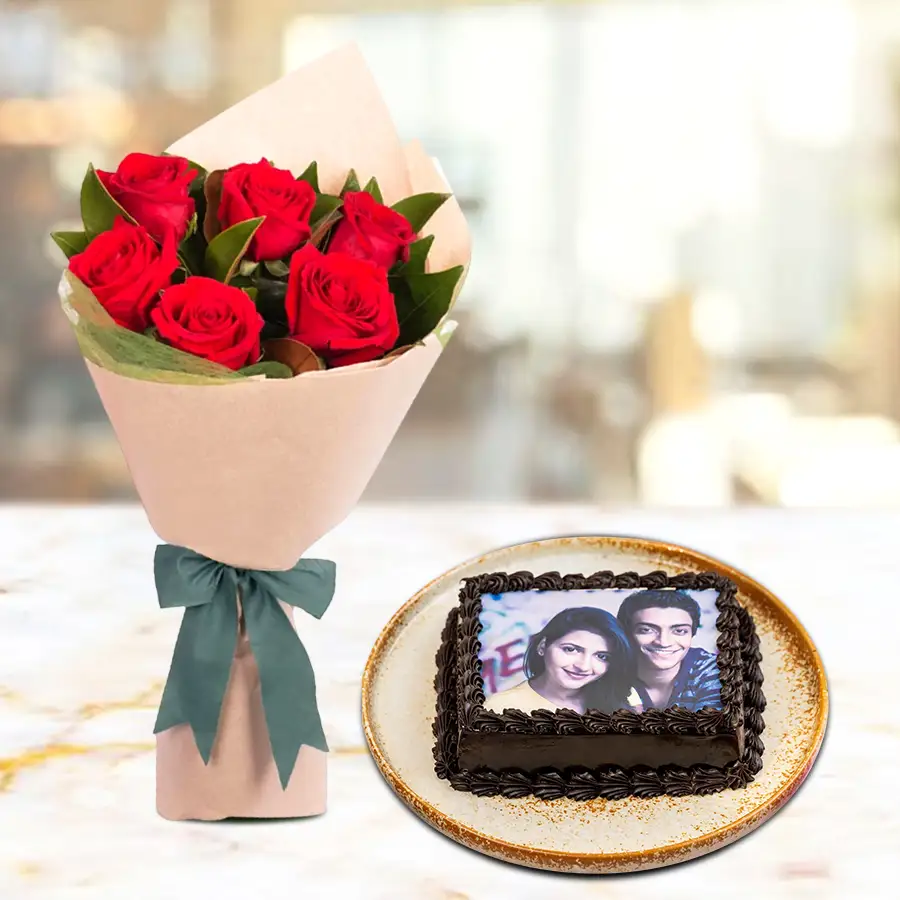 Exquisite combo of a 2.2lb chocolate photo cake and ten red roses for Chocolate Day celebration.