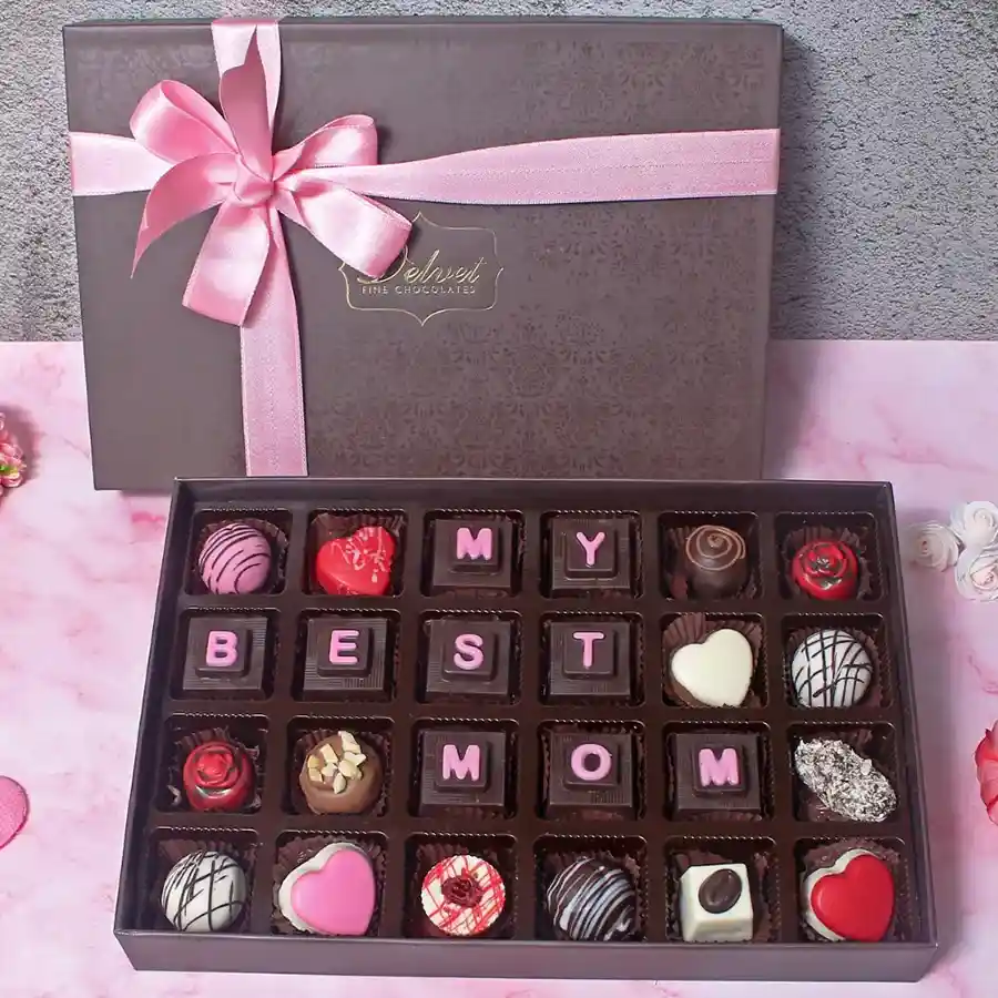 Assorted chocolates in a decorative box with "My Best Mom" stamp, perfect gift for Mother's Day.