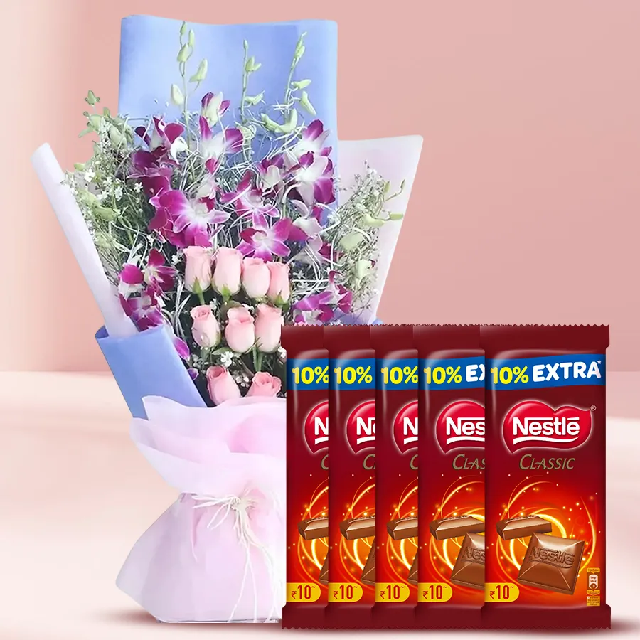 Enchanted bouquet of pink roses and purple orchids with Nestle chocolates.