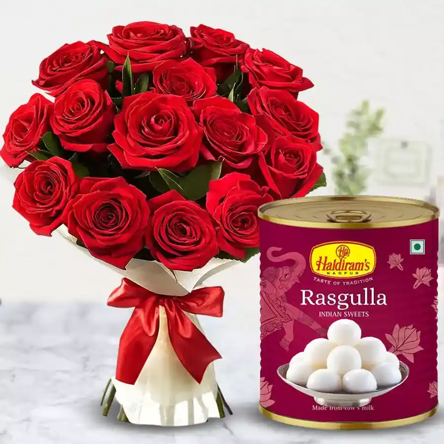 A romantic combo of 12 red roses and 1kg Haldiram Rasgulla tin, perfect for gifting.