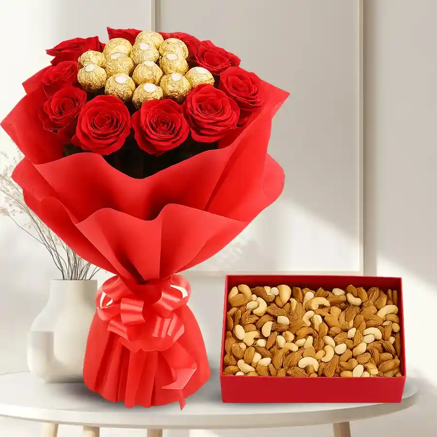 Bouquet of red roses, Ferrero Rocher chocolates, and a mixed dry fruits box, beautifully wrapped in red paper and ribbon.