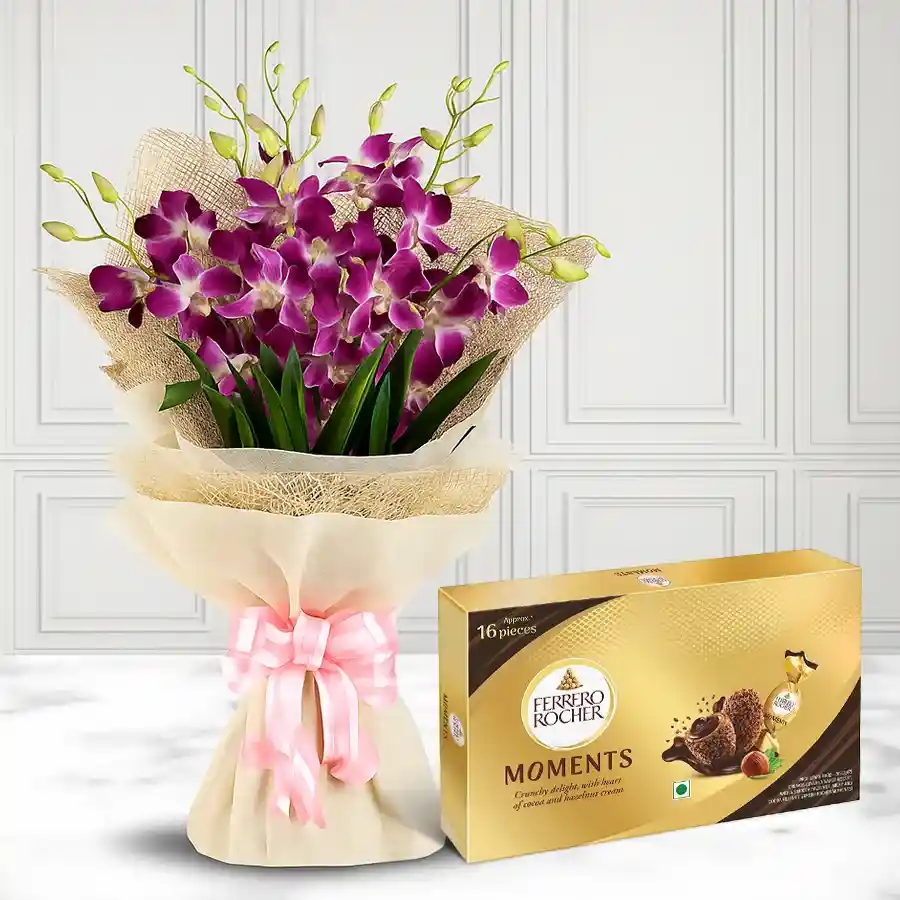 A stunning bouquet of 6 purple orchids with a Ferrero Rocher Moment chocolate box, perfect for expressing love and affection.