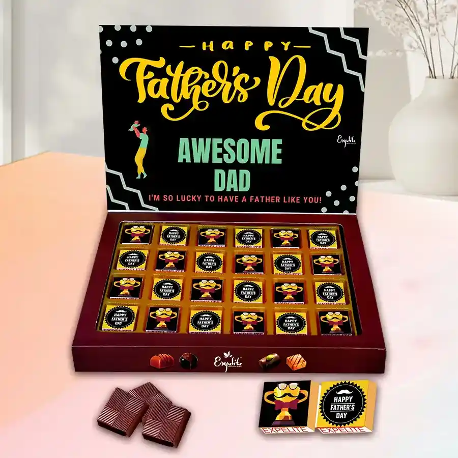 A beautifully arranged box of 24 handcrafted chocolates with a Father's Day theme, featuring various fillings like Roasted DryFruits, Cranberry, Paan, Mixfruit, and Butterscotch.
