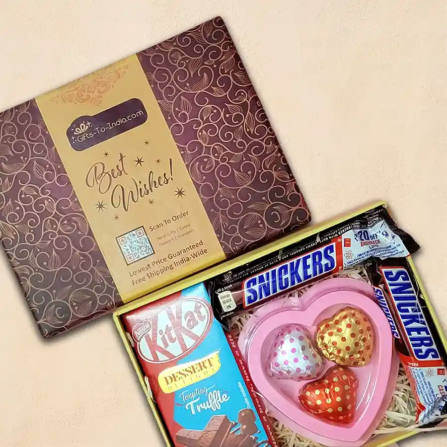 Chocolate Serenade Gift Box featuring mini Snickers bars, heart-shaped chocolates, and KitKat Dessert Delight arranged in a decorative packaging.
