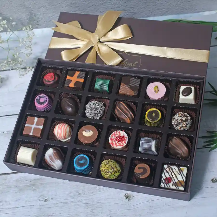 Luxe Assorted Chocolates Box with various chocolate pieces displayed elegantly