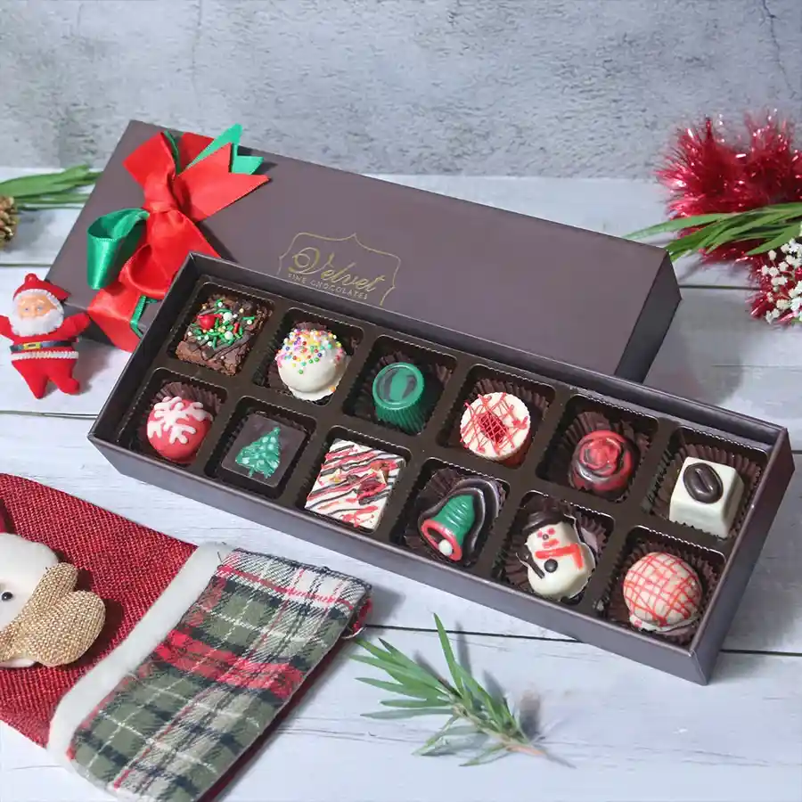 Christmas Special Chocolaty Temptations Box filled with assorted chocolates, brownie bites, nutty treats, and truffles, elegantly presented for gifting