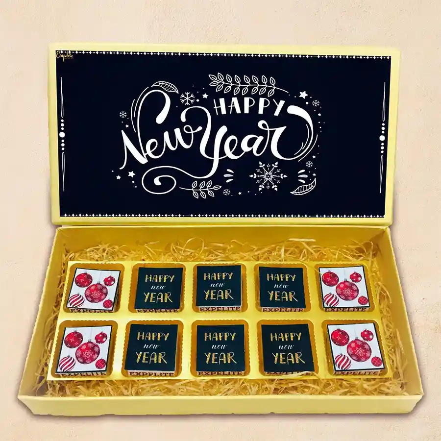 A beautifully arranged box of assorted chocolates featuring unique flavors like roasted dryfruit, cranberry, paan, butterscotch, mixed fruits, and chocochip, all set against a festive digital print design.