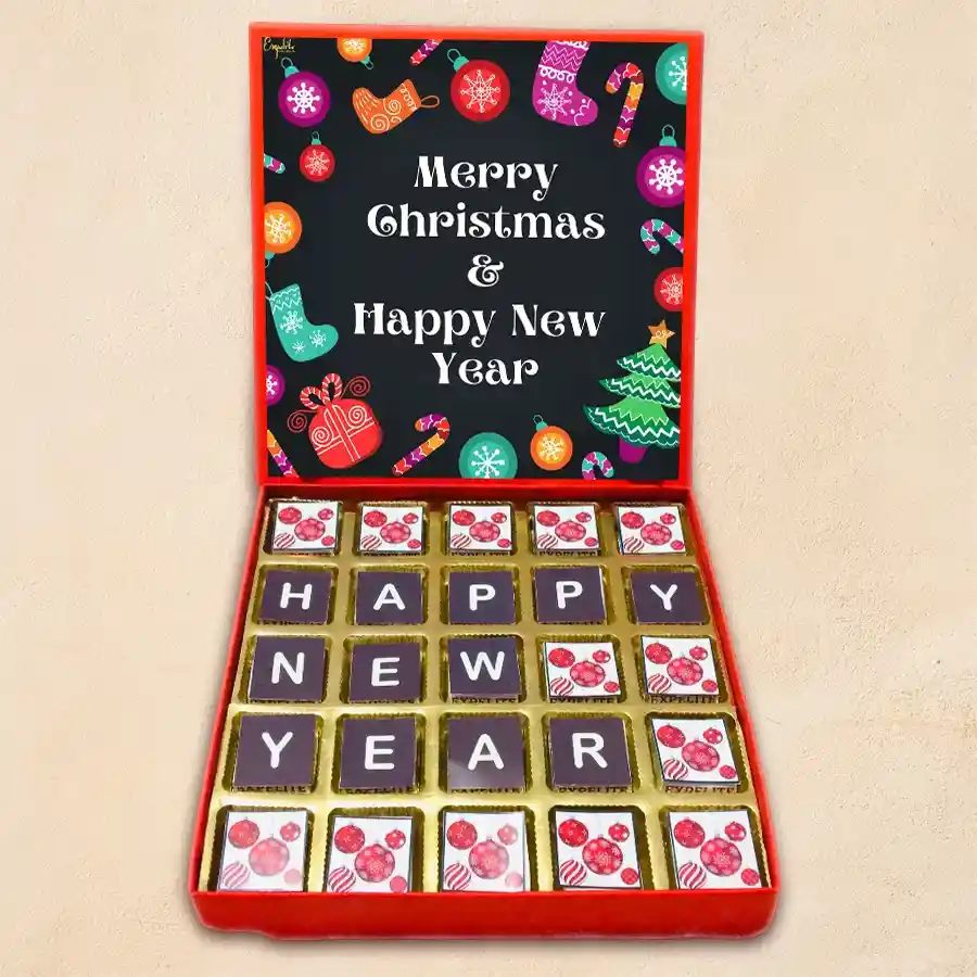 A decorative box filled with 25 assorted chocolates featuring festive designs for Christmas and New Year, showcasing a variety of flavors including dry fruit, cranberry, paan, butterscotch, mixed fruits, and chocochip.