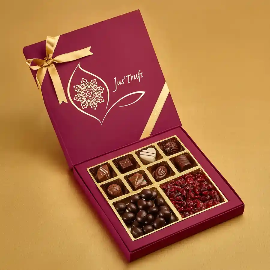Festive Truffle and Nuts Delight Box featuring dark chocolate-coated almonds, masala cranberries, and assorted truffles in an elegant Mandala box.