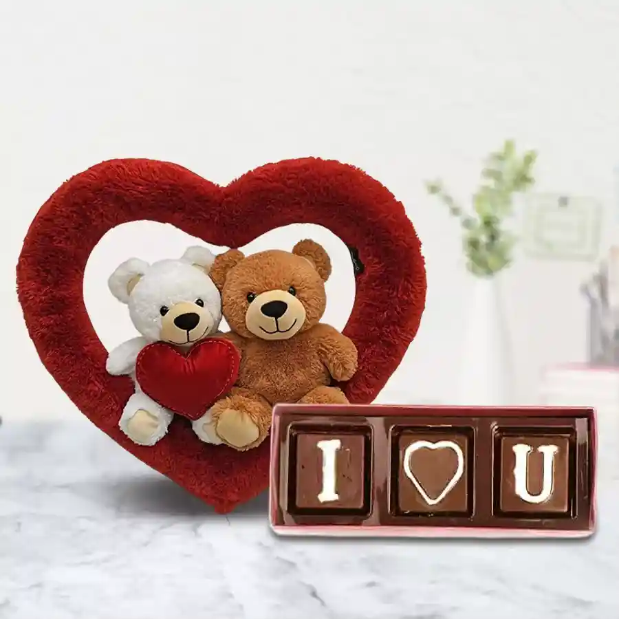 Exclusive Twin Teddy bear cushion with heart shape and three homemade chocolates in a romantic gift setting