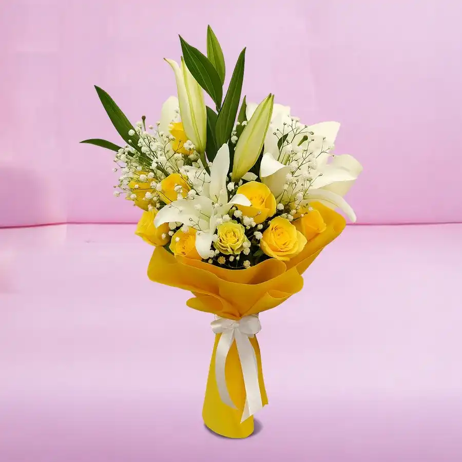 Radiant Blooms of Joy Bouquet featuring yellow roses and white lilies in a hand-tied arrangement.