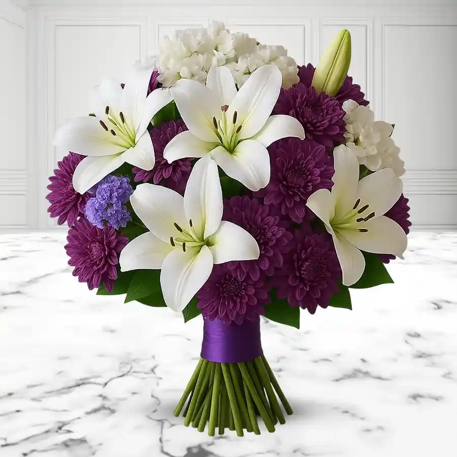 Ethereal bouquet featuring 12 white Asiatic lilies and purple chrysanthemums, perfect for special occasions or heartfelt gestures.