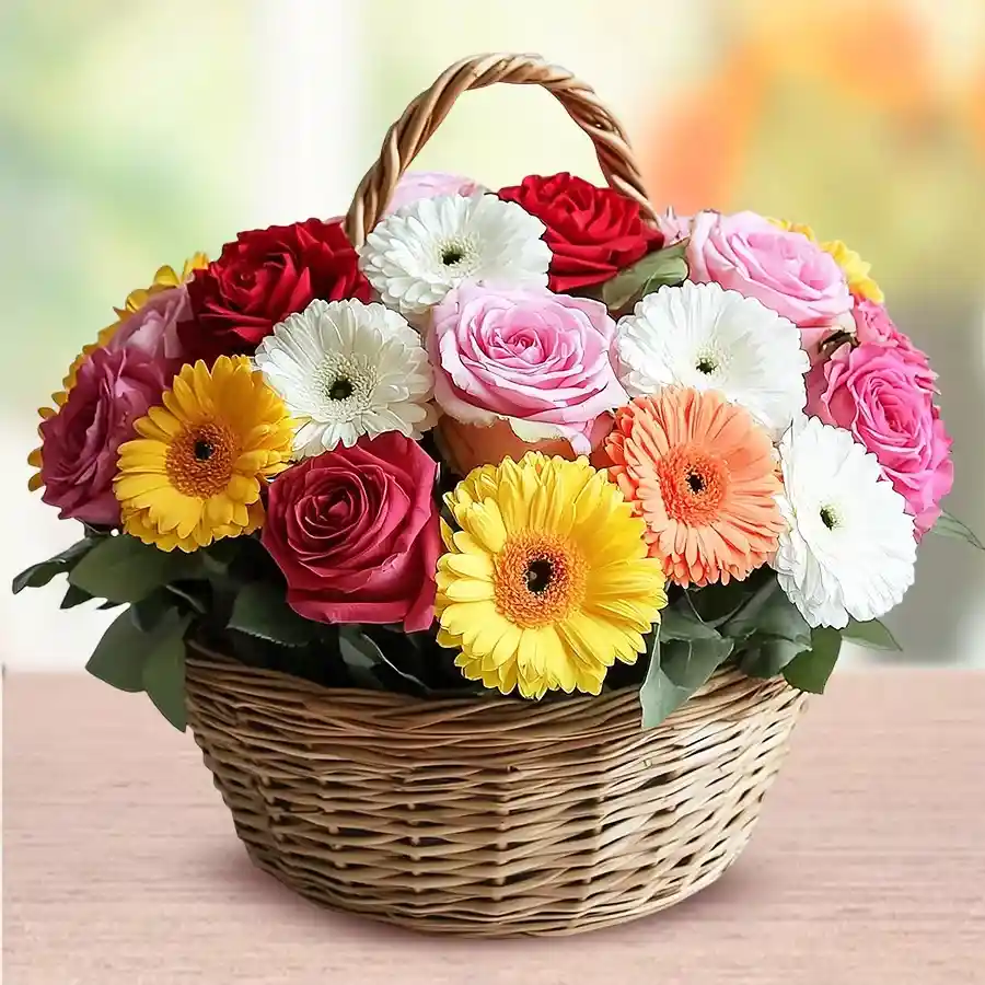 Blossoms of Joy Floral Basket with mixed roses, carnations, and gerberas.