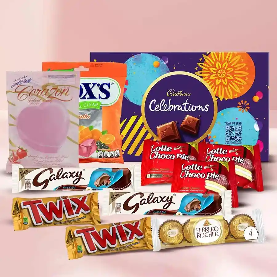 Delicious Chocolate Hamper filled with various chocolates including Cadbury, Ferrero Rocher, Twix, Galaxy, Corazon, Chocopies, and Foxs.