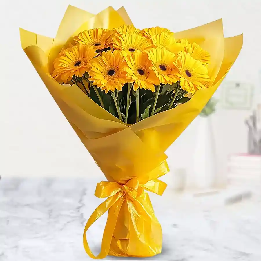 A vibrant bouquet featuring 10 bright yellow Gerberas, perfect for gifting and expressing heartfelt emotions.