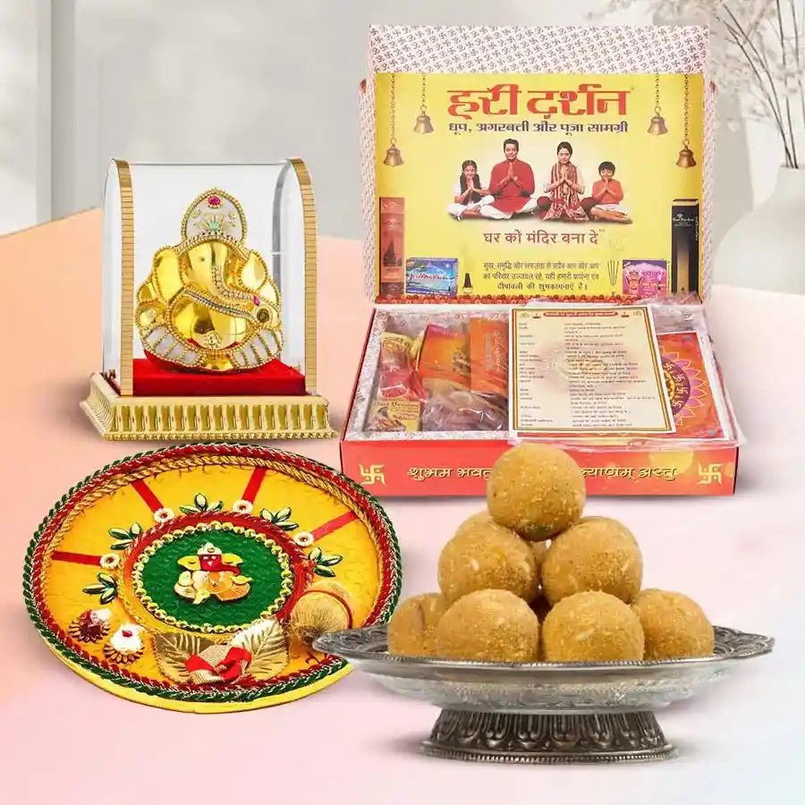 Welcoming Fortune Combo for Ganesh Chaturthi featuring a Shree Puja Thali, Puja Samagri, ½ Kg Haldirams Moong Laddoo, and a Vighnesha Statue
